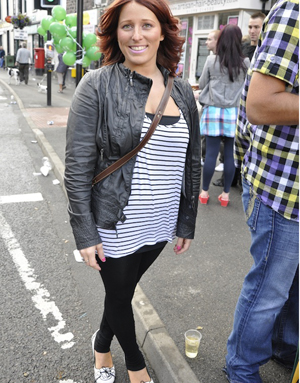 Street style contestant in a nautical striped top, leggings and leather jacket